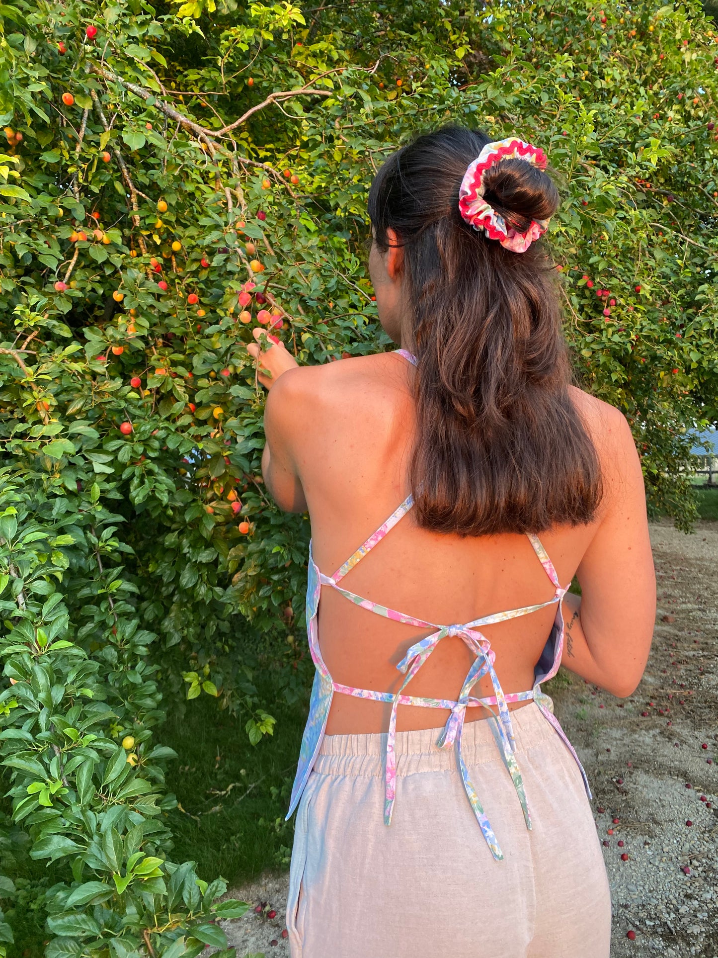 Top dos nu à fleurs pastels